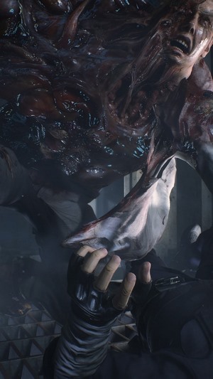 Leon S. Kennedy fighting a G-Virus monster in Resident Evil 2