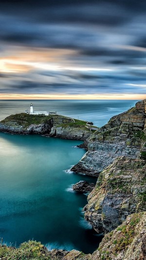 Seascape with Lighthouse and Rocky Coastline