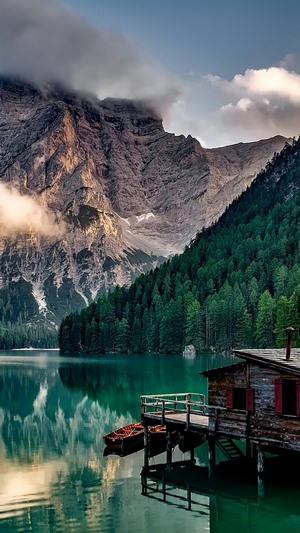 Lake and Mountains with a Cottage