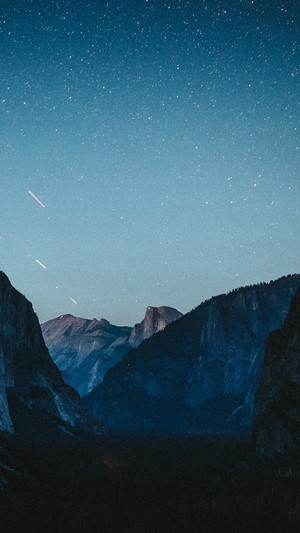 Night sky over Yosemite Valley mountains