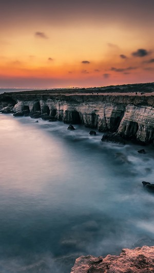 Sea caves at sunset