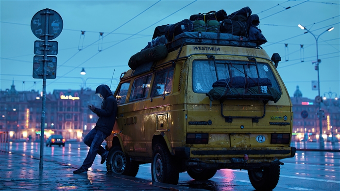 Yellow Westfalia Van at Night with Camper