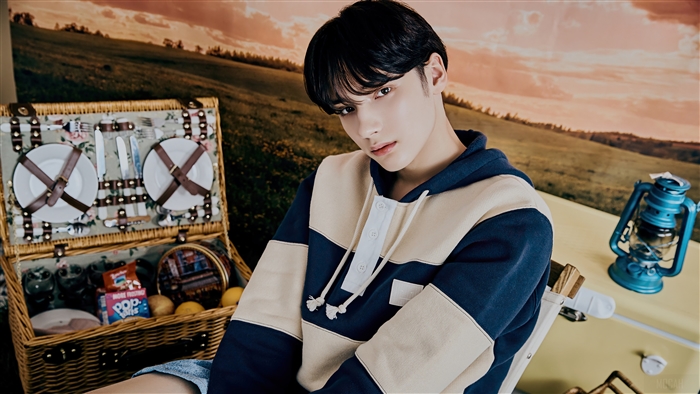 Huening Kai from TXT at a picnic photoshoot