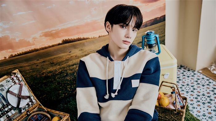 Huening Kai from TXT in a picnic photoshoot