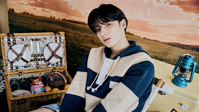 Huening Kai from TXT in a picnic photoshoot
