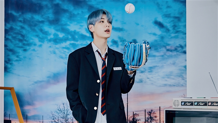Soobin from TXT with baseball glove and ball