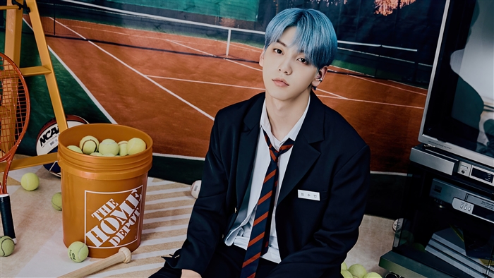 Soobin from TXT in a tennis-themed photoshoot