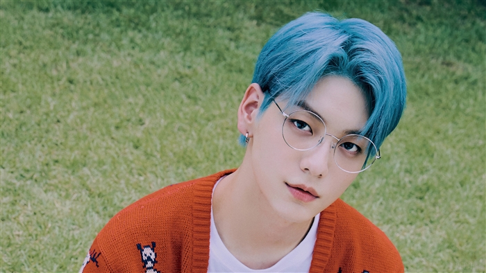 Soobin from TXT wearing glasses in a photoshoot