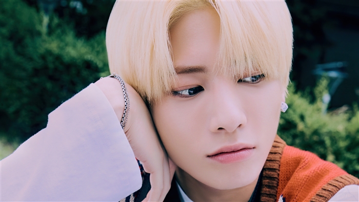 Taehyun from TXT in a photoshoot