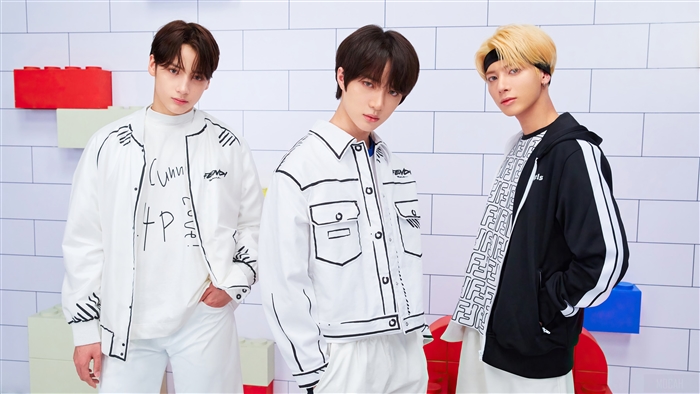 TXT Kpop members Huening Kai, Beomgyu, and Taehyun