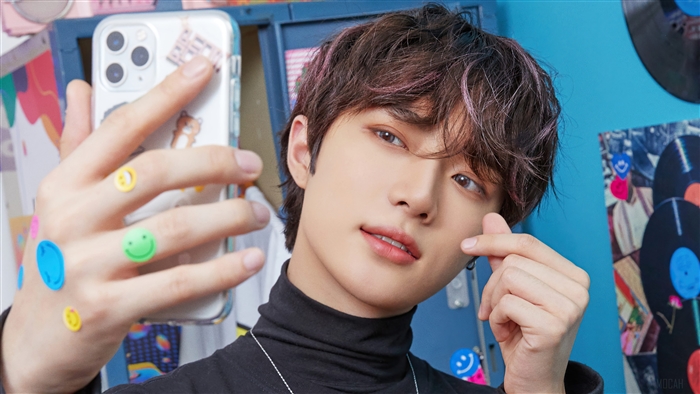 Beomgyu from TXT taking a selfie