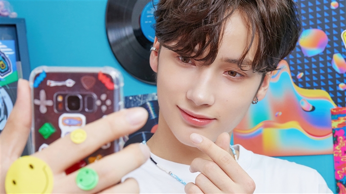 Huening Kai from TXT taking a selfie