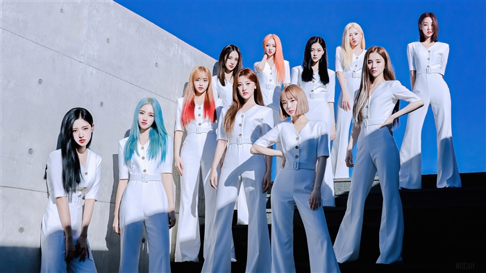 LOONA members in white outfits against a blue sky