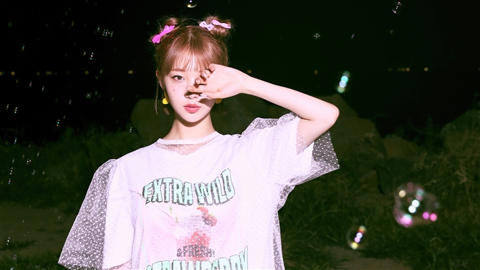 Yeojin from Loona with pink hair buns