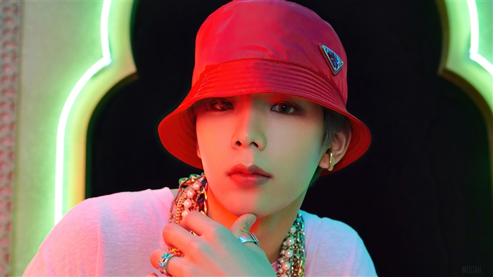Shotaro from NCT U wearing a red bucket hat