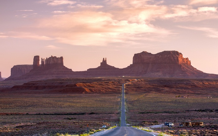 Monument Valley at sunset with a road