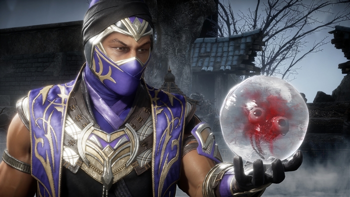 Rain from Mortal Kombat 11 holding a frozen orb with eyes
