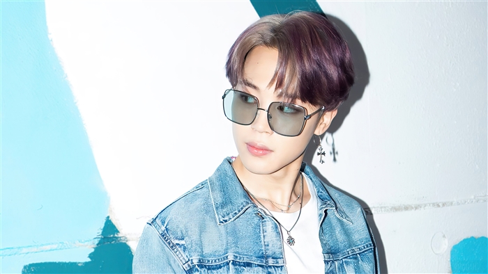 Jimin from BTS wearing sunglasses and denim jacket