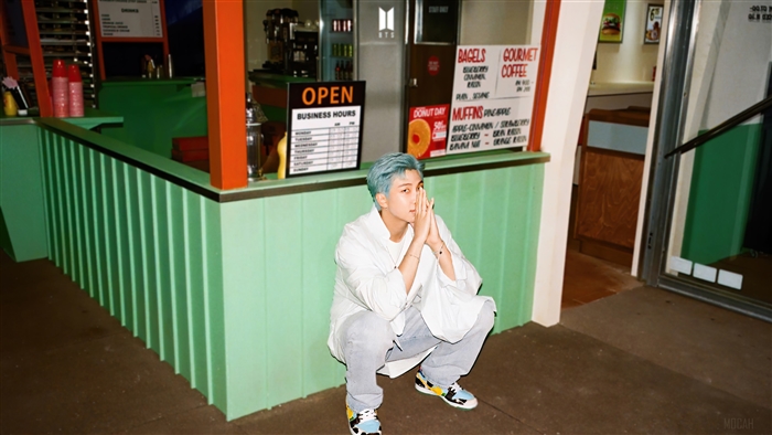 RM from BTS in front of a diner