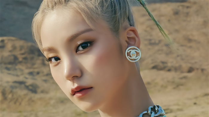 Yeji from ITZY wearing Chanel earrings
