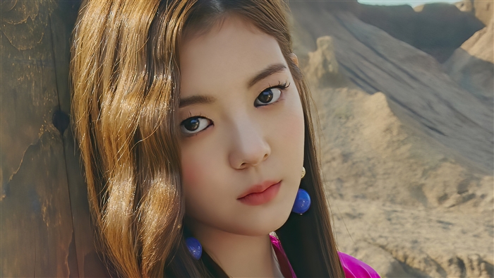 Lia from ITZY in desert landscape