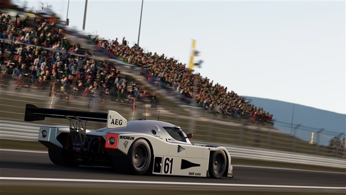 Racing car with number 61 on a race track