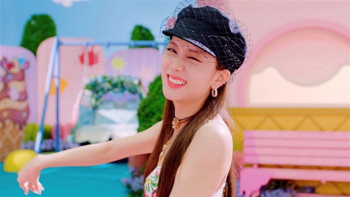 Jisoo from BLACKPINK wearing a black hat