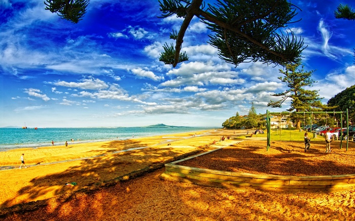 Beach with playground and distant island