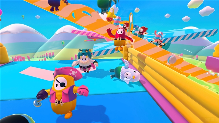 Fall Guys Ultimate Knockout characters on a colorful obstacle course