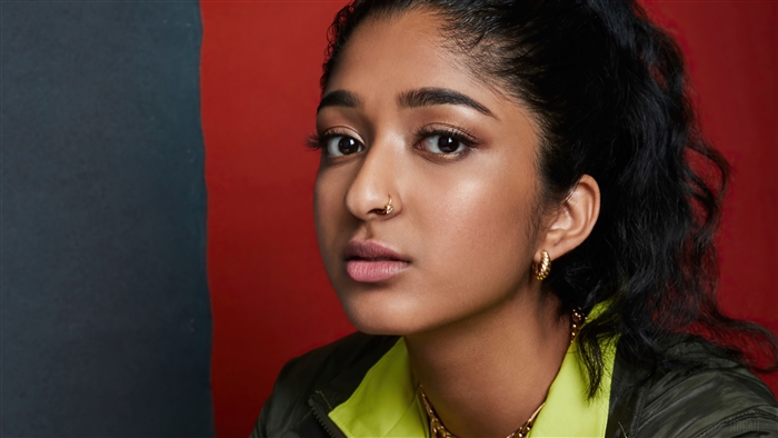 Maitreyi Ramakrishnan in a green jacket