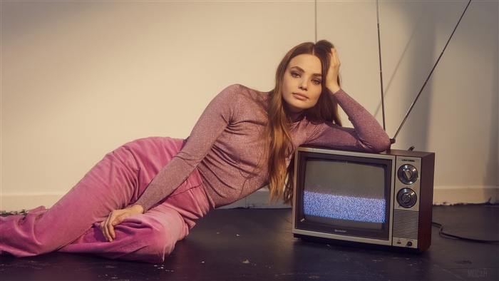 Kristine Froseth with vintage television 4K