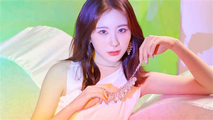 Chaeyeon from IZONE holding a necklace