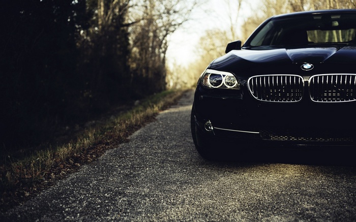 Black BMW M3 on a Road