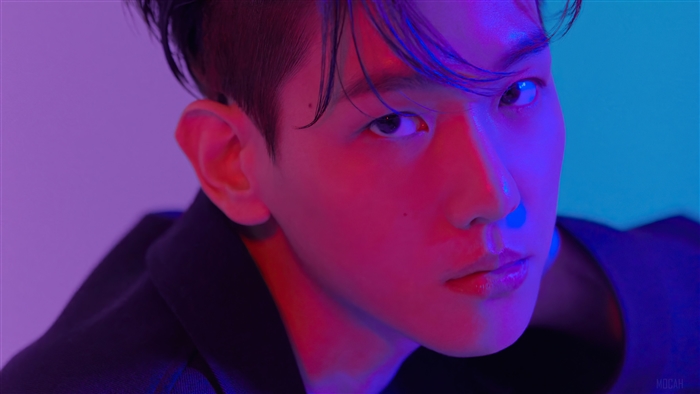 Baekhyun Close-Up with Vibrant Blue and Red Lighting 4K