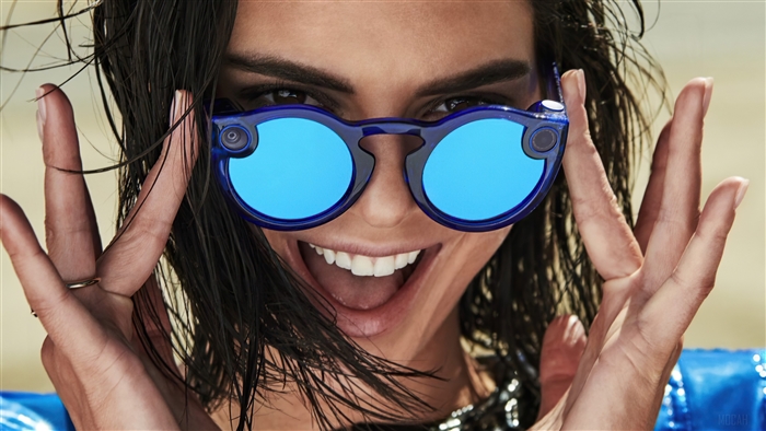 Kendall Jenner wearing blue sunglasses
