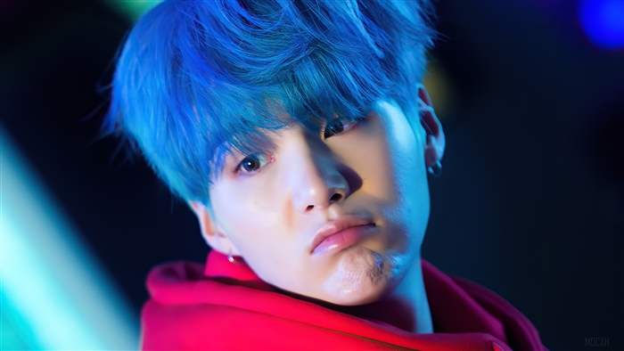 Suga from BTS with Blue Hair in Red Hoodie