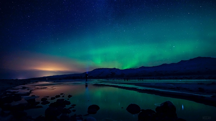 Aurora Borealis over Mountains and Water 4K