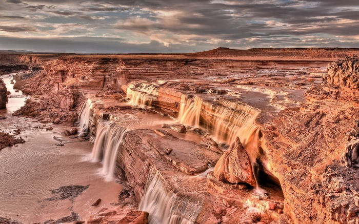 Grand Canyon with waterfalls at sunset