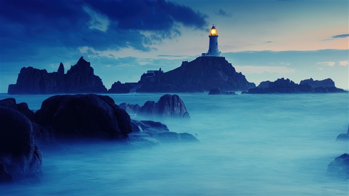 Lighthouse at Sea During Sunrise 4K