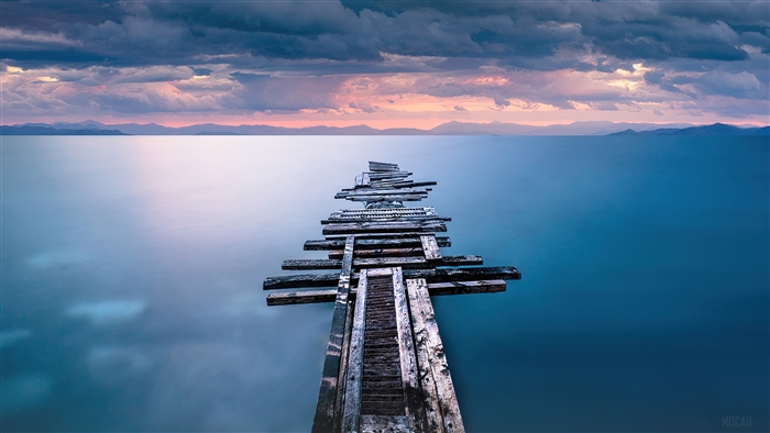 Calm Ocean Pier at Sunset 4K