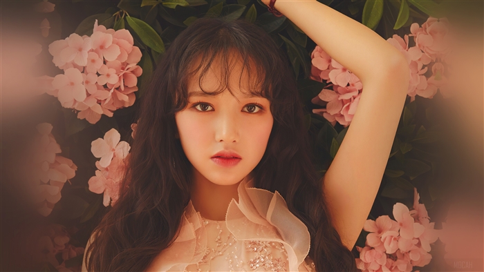 Cheng Xiao in front of pink flowers