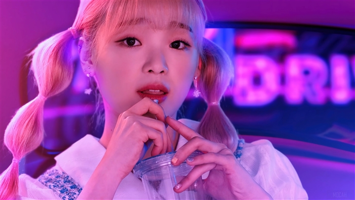 Seunghee from Oh My Girl with pink pigtails
