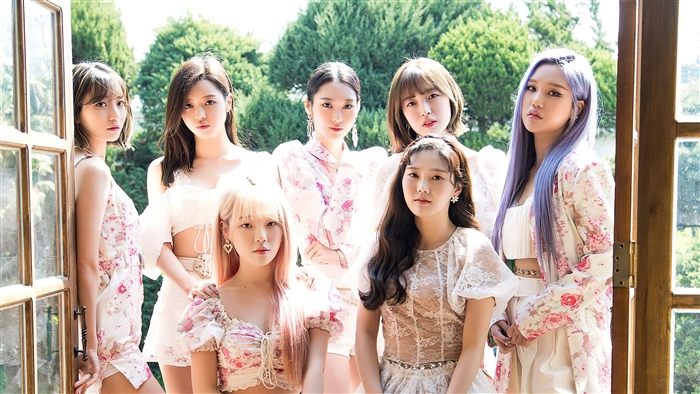 Oh My Girl group members in floral outfits