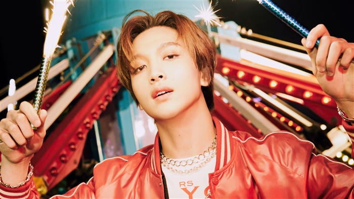 Haechan from NCT Dream holding sparklers
