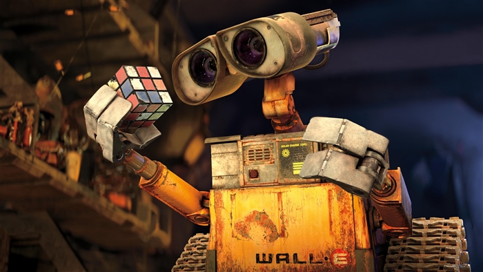 Wall-E holding a Rubik's Cube