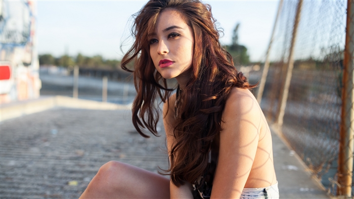 Woman sitting outdoors
