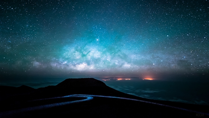 Milky Way over a mountain road at night 4K
