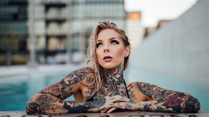 Woman with Tattoos in Pool 4K