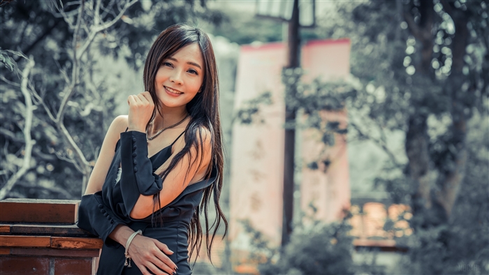 Smiling Asian Woman with Long Black Hair in Nature 4K