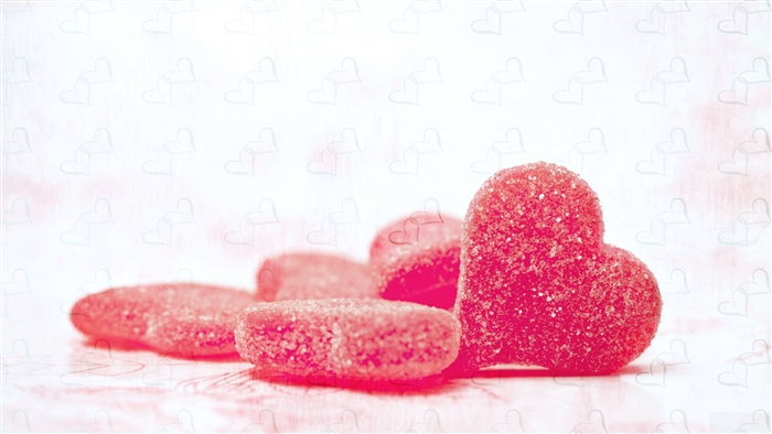 Heart-shaped candies with sugar coating